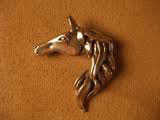 pins de oro